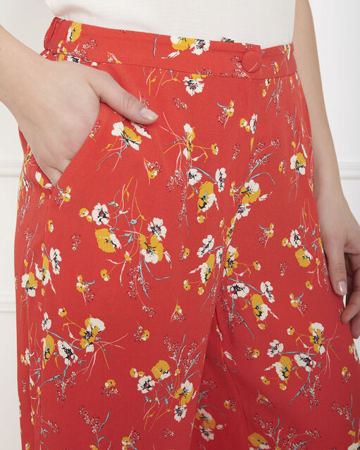Pantalon rouge large imprimé fleuri gigi geranium.