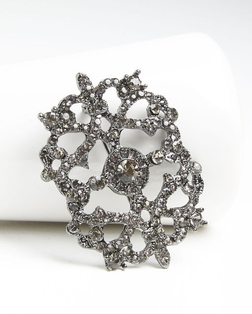 Broche argentée et pierres xena argent.