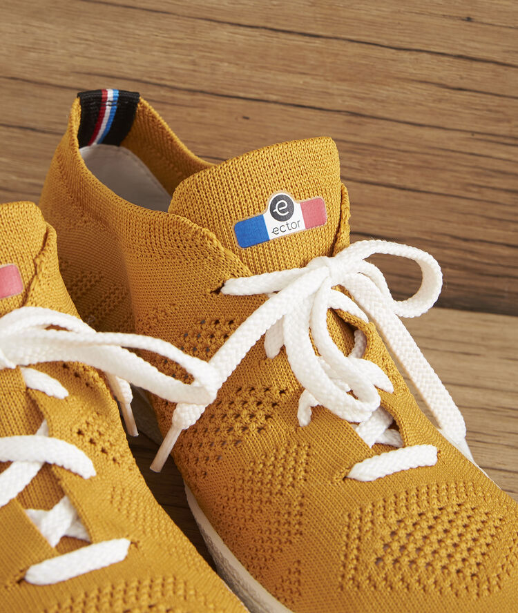 Gele sneakers met breiwerk ector bouton d'or.