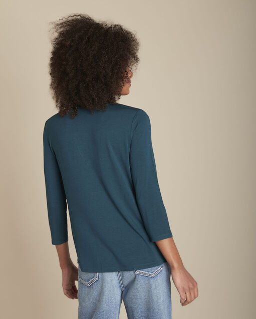 Dennengroene blouse uit twee materialen met tunesische kraag genna cypres.