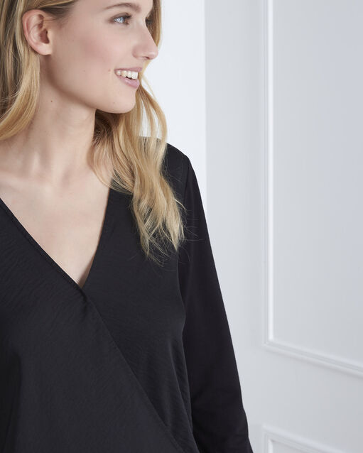 Schwarze bluse aus bimaterial in wickel-optik schwarz.