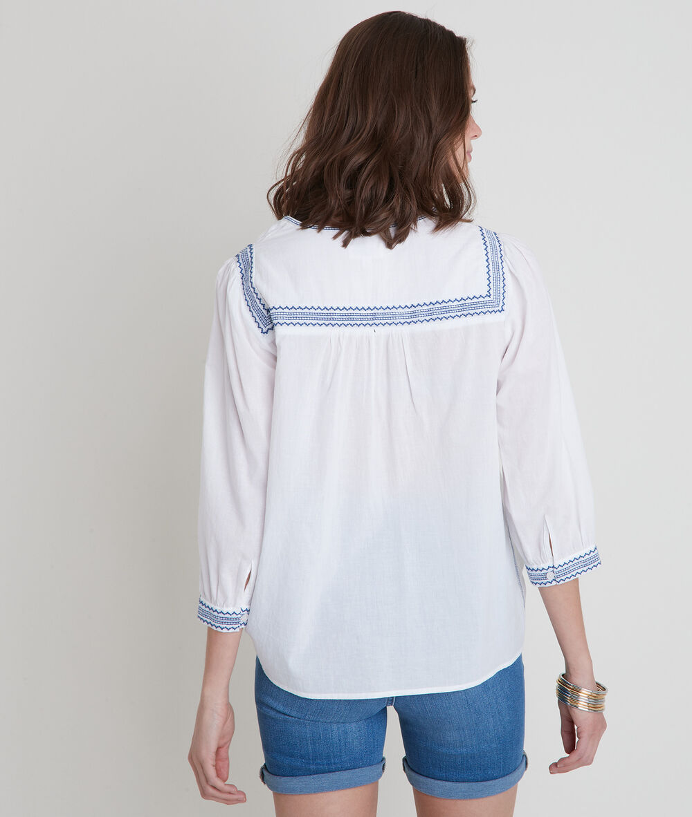 Blouse blanche brodée talissa ciel.