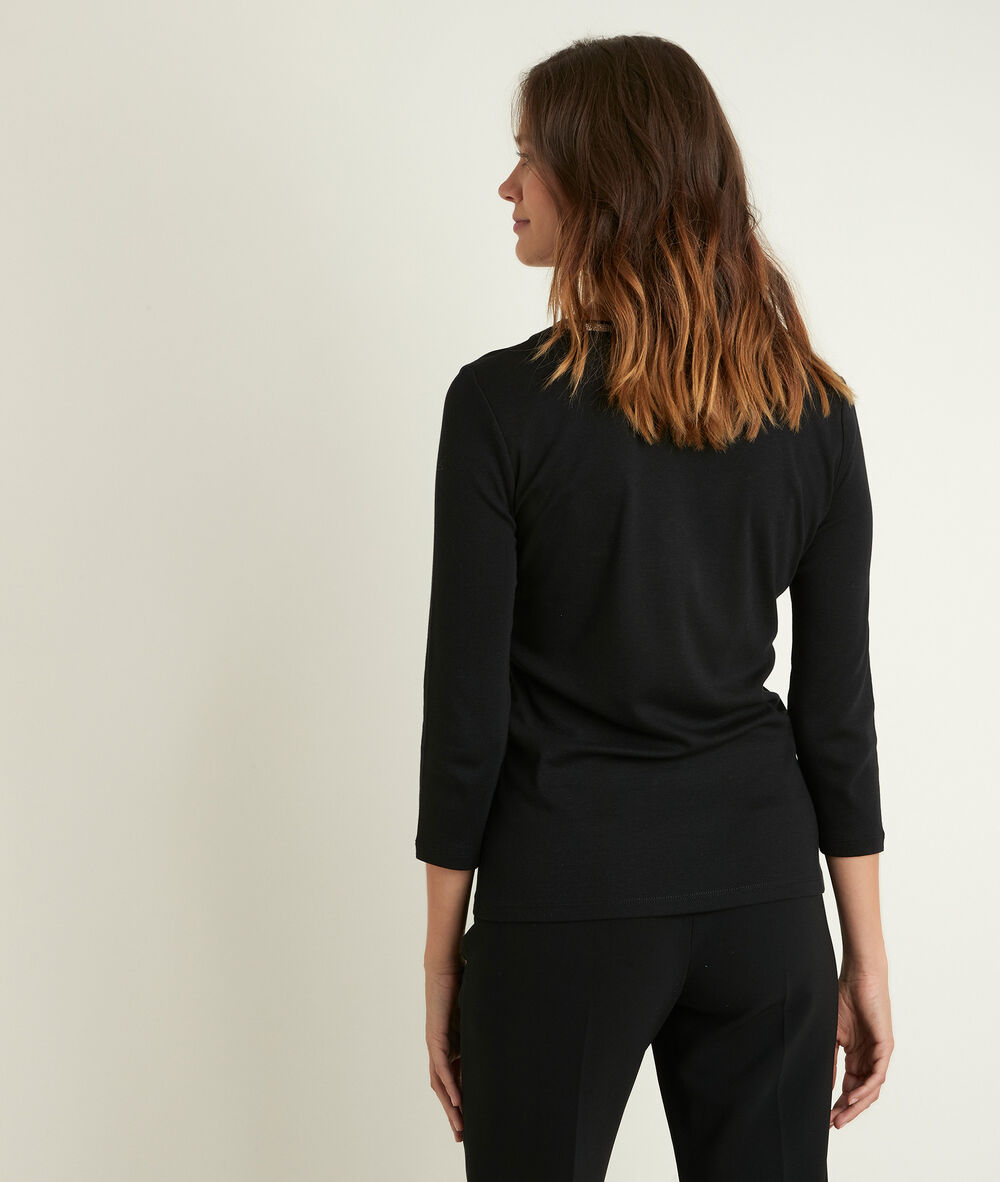 Tee-shirt noir encolure fantaisie calypso noir.