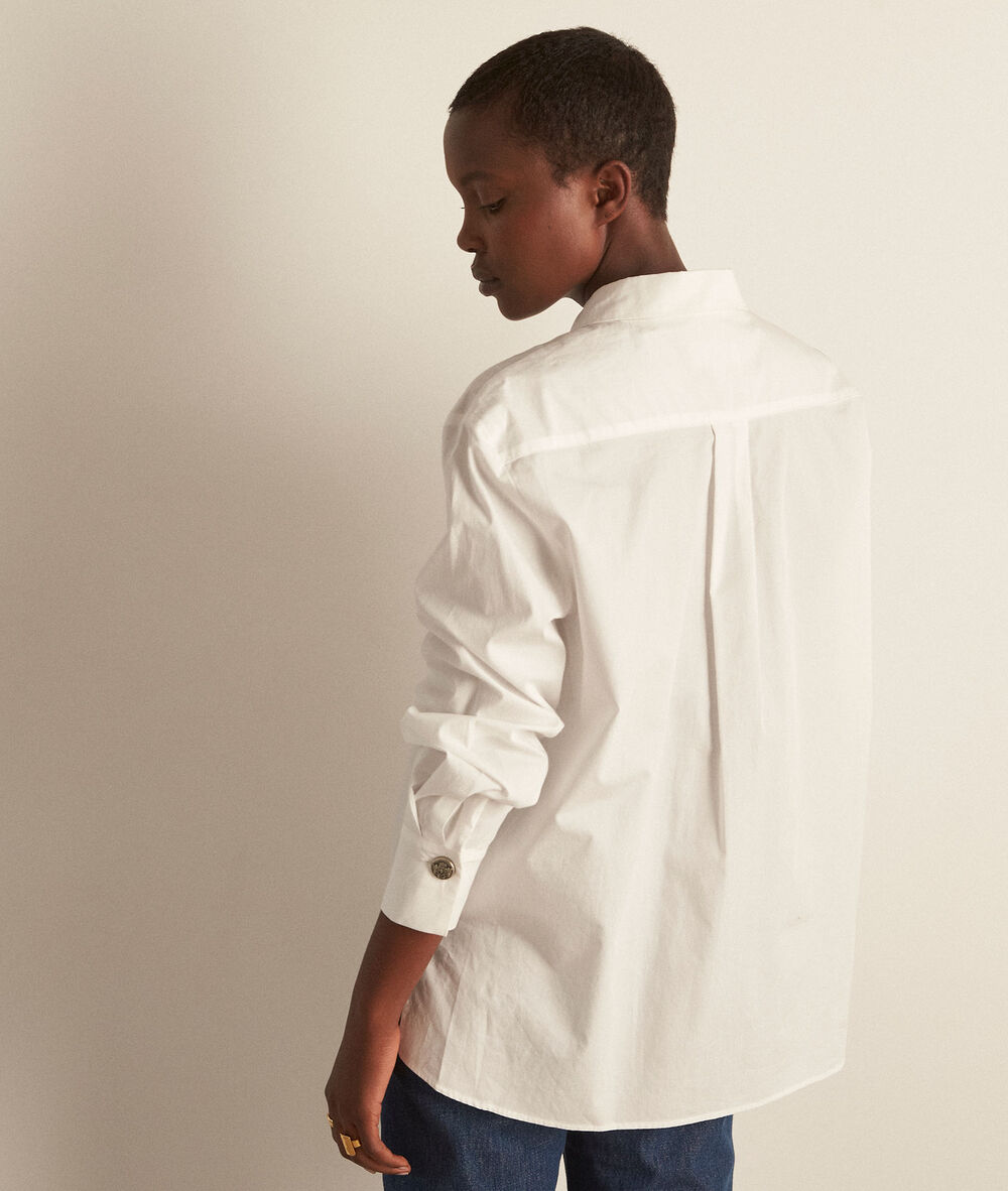 Chemise intemporelle en coton blanc esmeralda blanc.