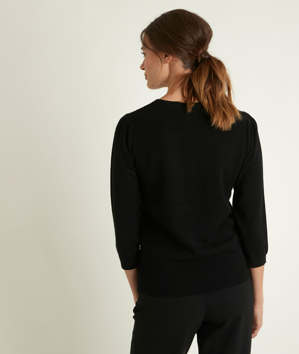 Pull noir nid d'abeille rimel noir.