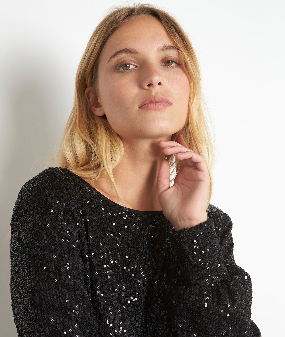 Robe à sequins charme noir.