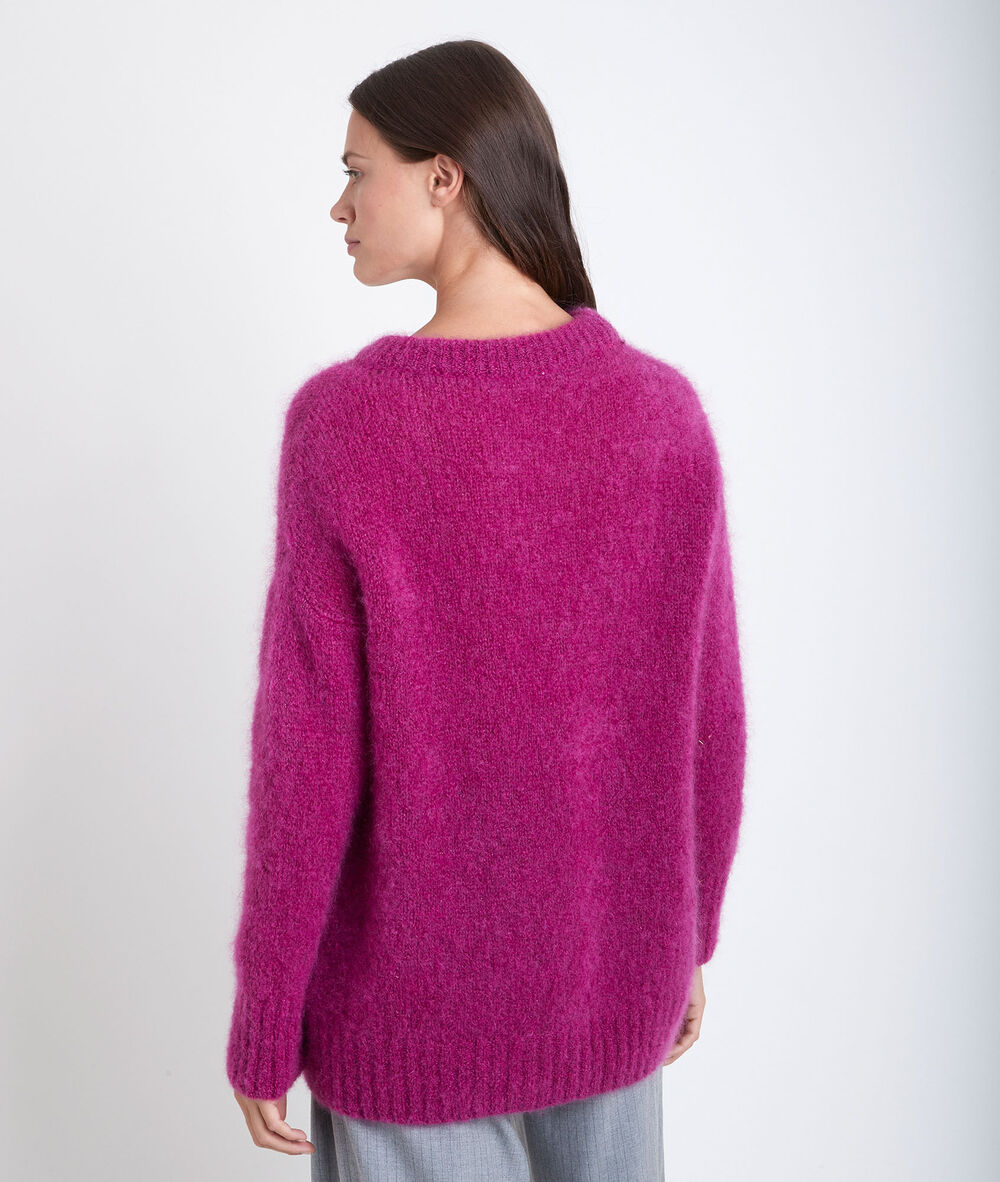 Pull en laine radiosa fuchsia fonce.