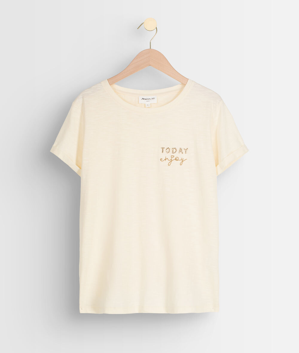 Vanillekleurig t-shirt met opschrift met strassteentjes ipso paille.