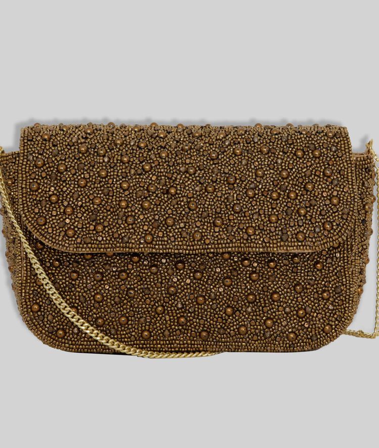 Pochette brodée dorée hanae or blanchi.