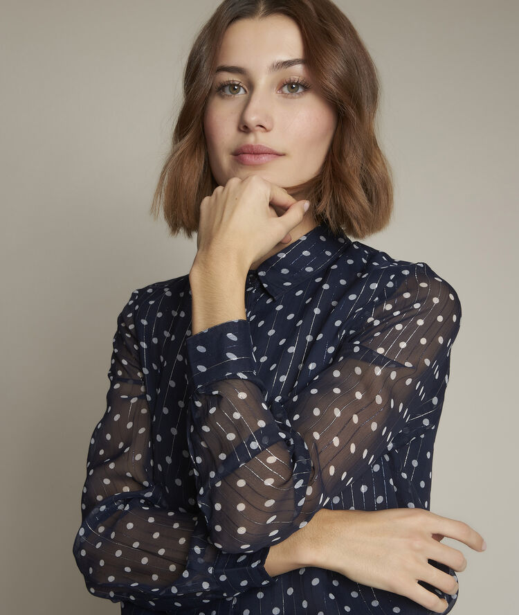 Blouse &agrave; pois evita marine.