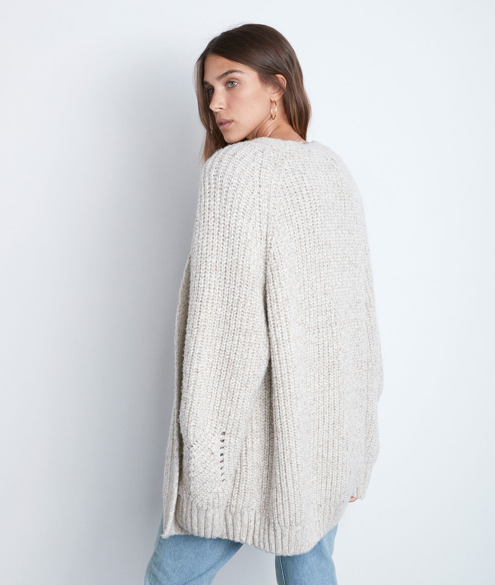 Cardigan beige col v turban beige.