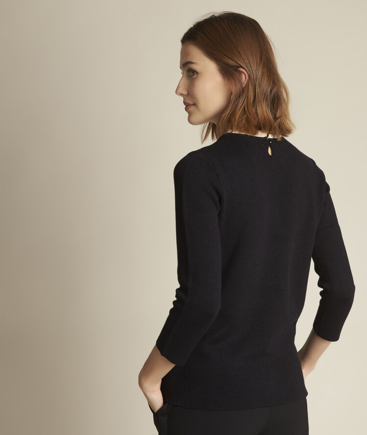 Pull ottoman col fantaisie declic noir.