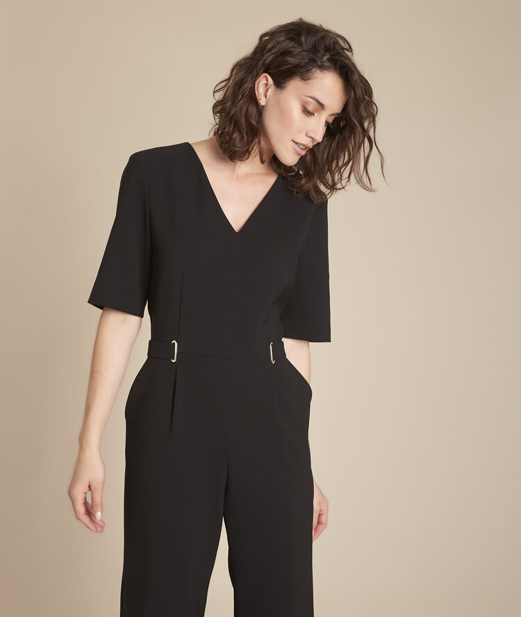 Zwarte jumpsuit van microvezel met oogjes idaya noir.