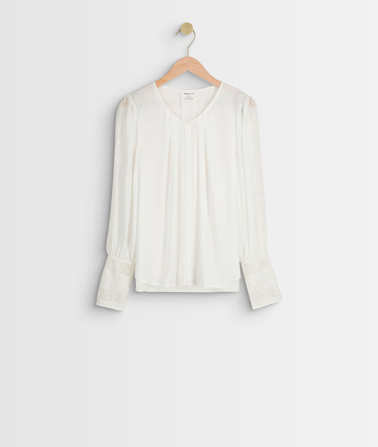 Blouse en dentelle jabi.