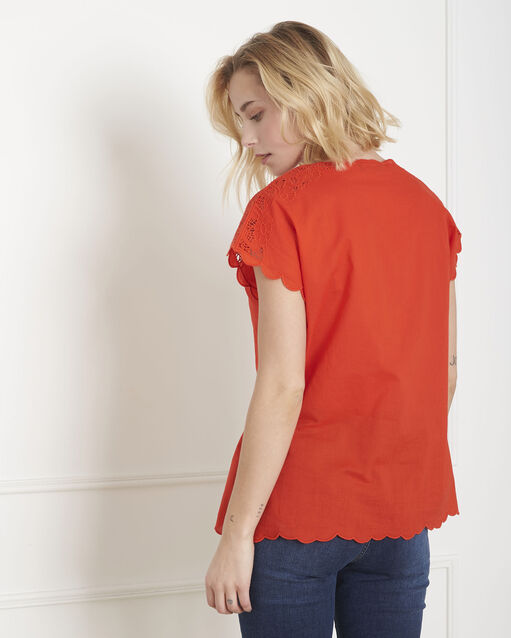 Blouse rouge brodée volage orange.