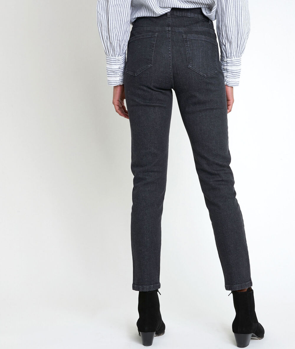 L'iconique slim jean noir à studs canelle noir.