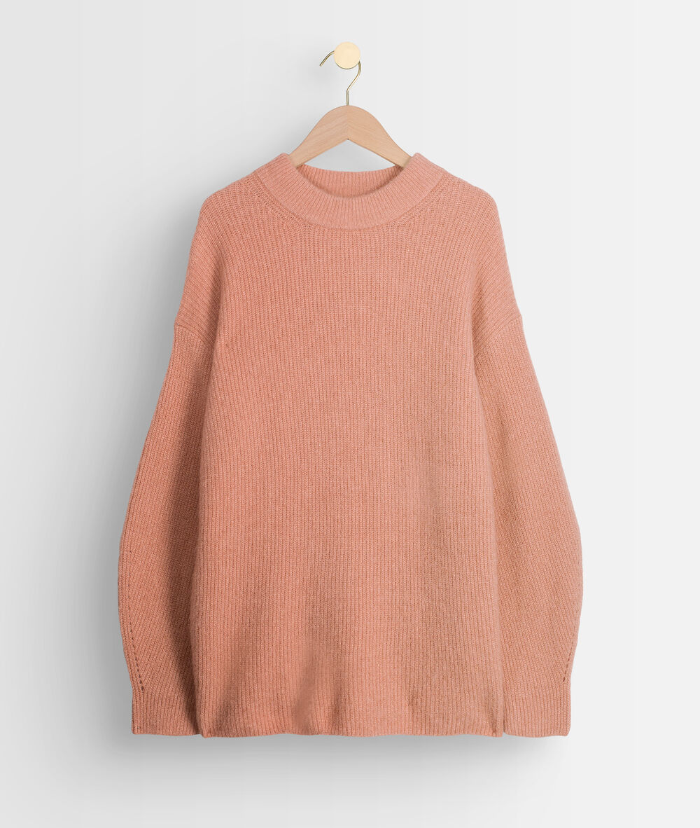 Pull en maille rose poudré tabasco blush.