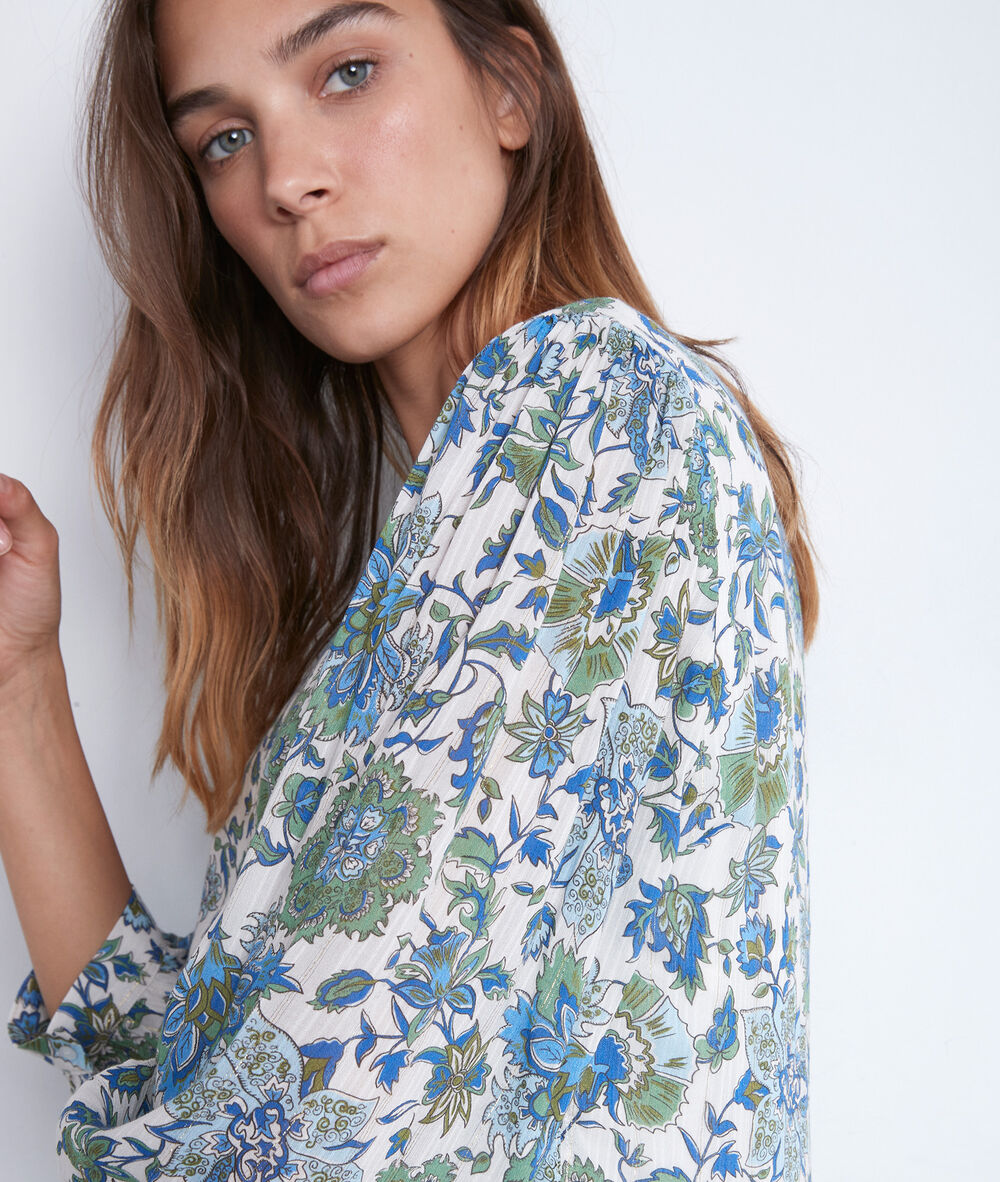 Robe courte et légère à l'imprimé fleuri bleu calypso ecru.