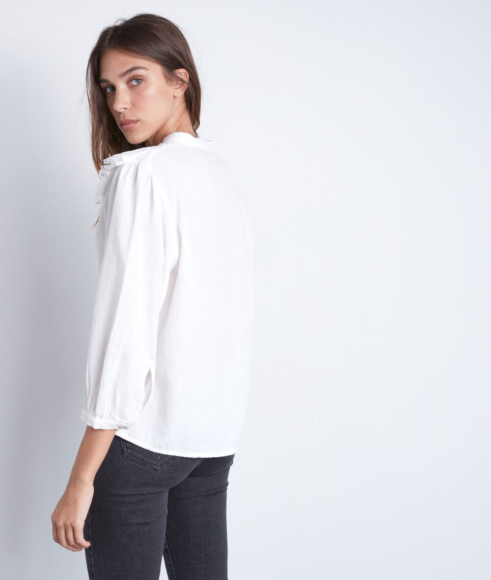 Blouse blanche à volants anane ecru.