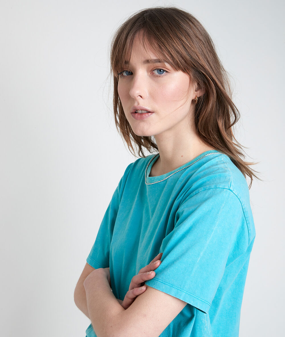 Tee-shirt en coton biologique turquoise à strass inox turquoise.
