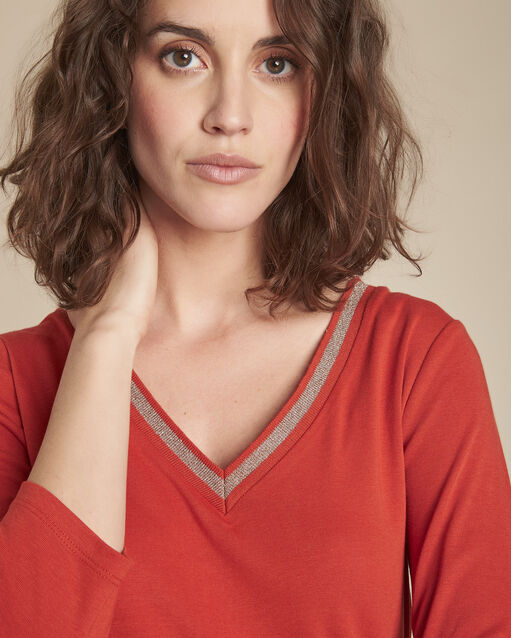 Tee-shirt orange encolure v fantaisie calypso sable.