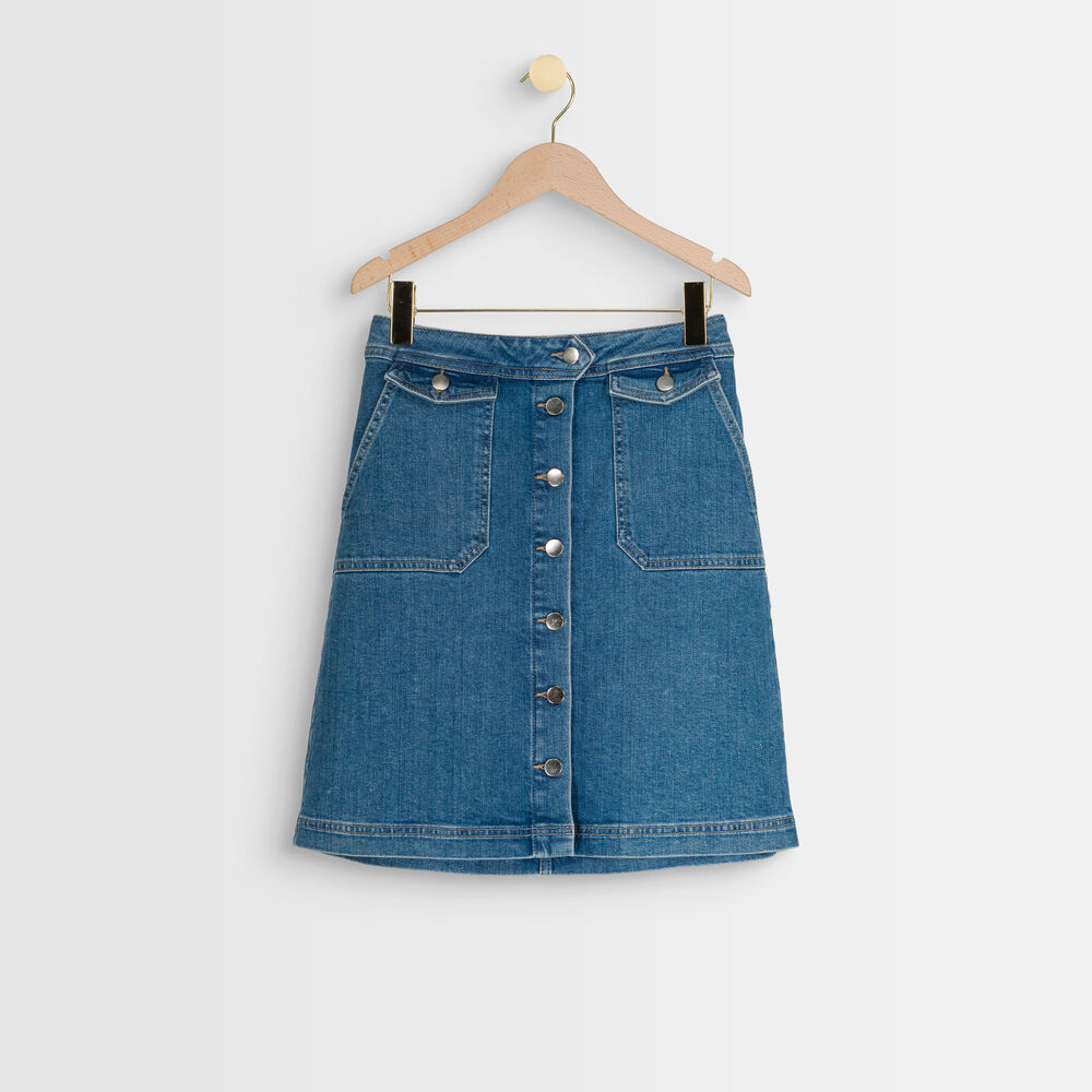 Jupe en jean boutonnée ambre denim brut.